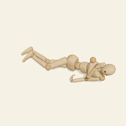 Side Reclining Rest pose reference, high-angle view of a wooden drawing mannequin